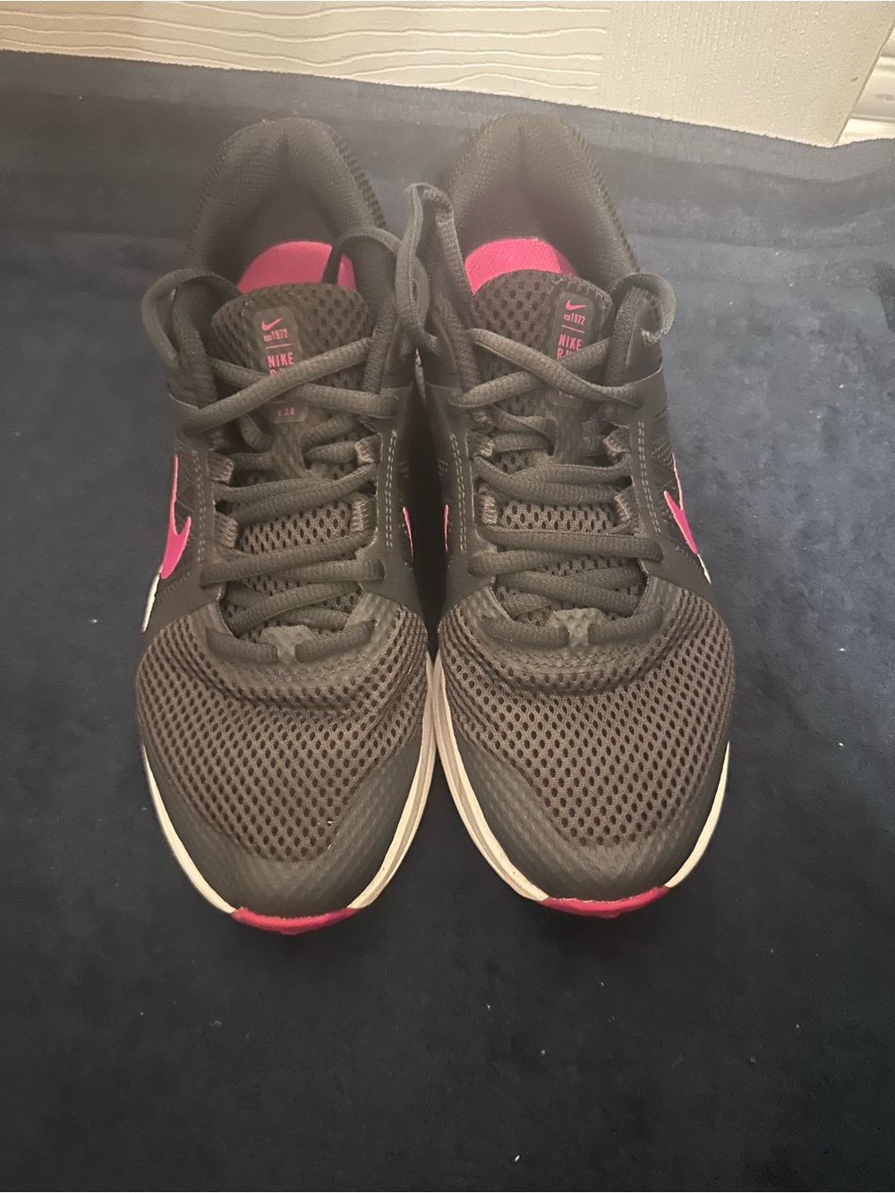 Nike Women's Black Athletic Running Sneakers with Pink Accents